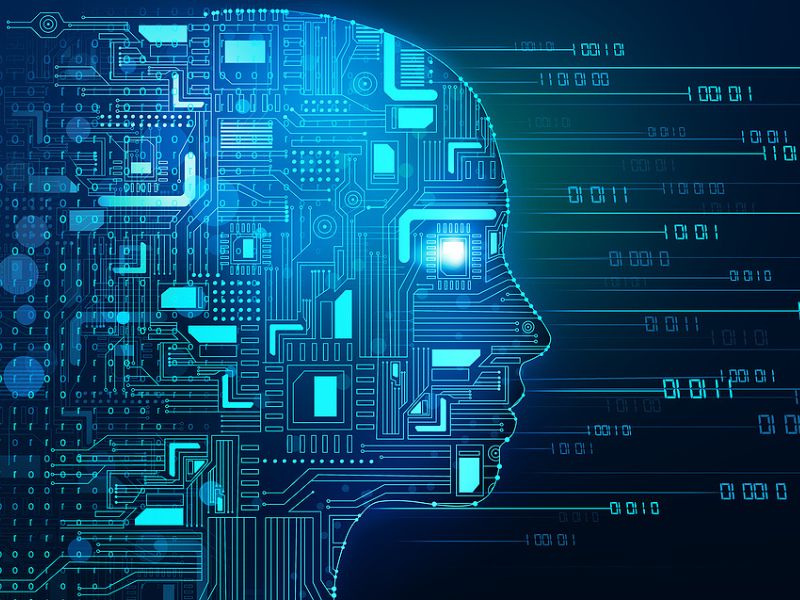 A glowing blue outline of a person's head filled with binary code and computer lines.