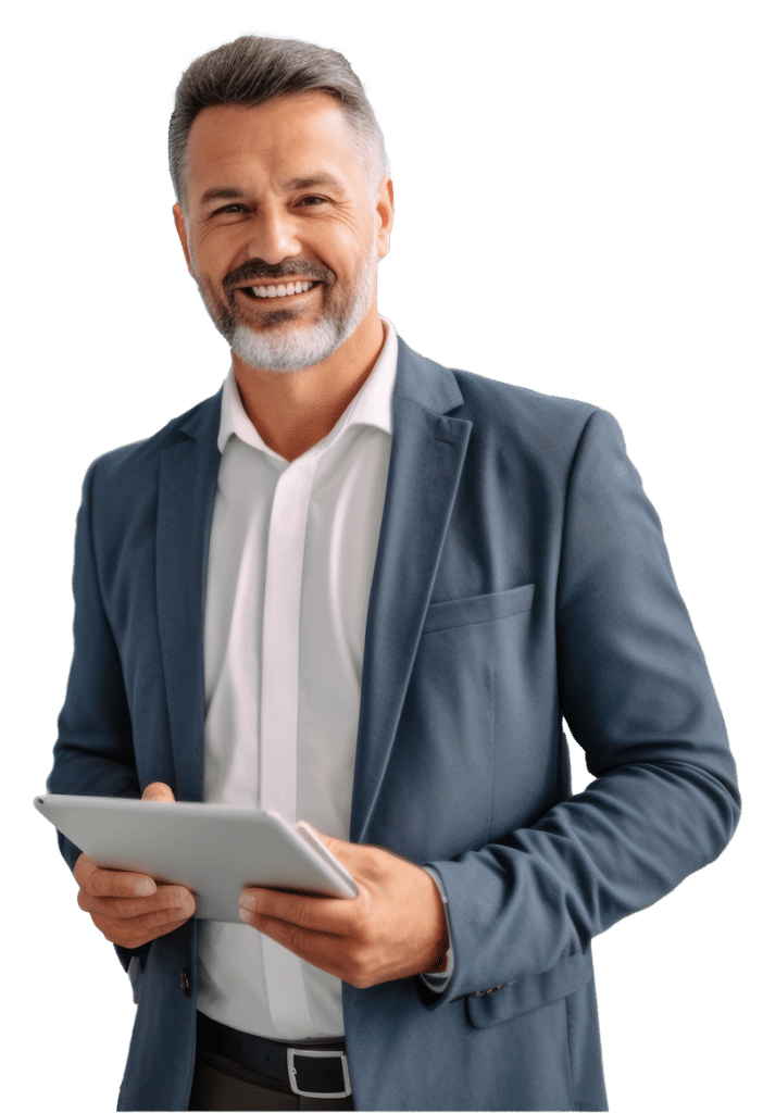 A man wearing a gray suit holding a white tablet in both hands.